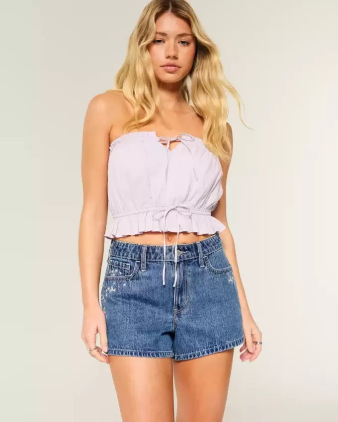 High-Rise Medium Wash Floral Embroidered A-Line Denim Shorts High-Rise Medium Wash Floral Embroidered A-Line Denim Shorts