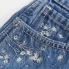 High-Rise Medium Wash Floral Embroidered A-Line Denim Shorts High-Rise Medium Wash Floral Embroidered A-Line Denim Shorts