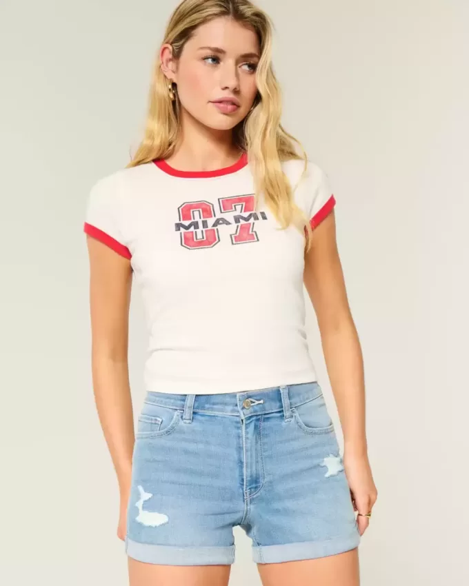 High-Rise Ripped Medium Light Wash Denim Shortie Shorts High-Rise Ripped Medium Light Wash Denim Shortie Shorts