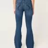 High-Rise Ripped Medium Wash Flare Jeans High-Rise Ripped Medium Wash Flare Jeans