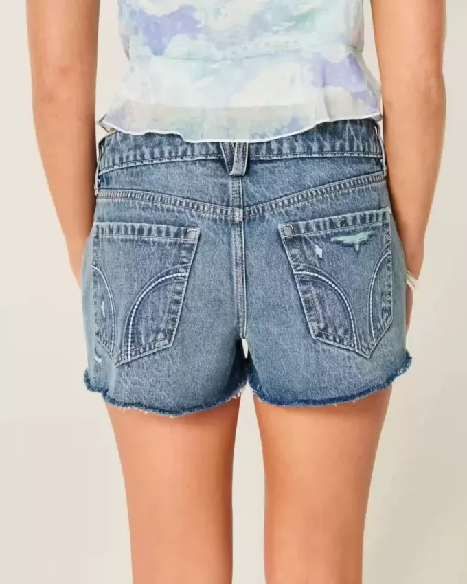 Low-Rise Distressed Medium Wash Denim Mini Shorts