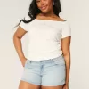 Low-Rise Light Wash Denim Shortie Shorts Low-Rise Light Wash Denim Shortie Shorts