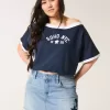 Low-Rise Medium Wash Star Applique Denim Mini Skort Low-Rise Medium Wash Star Applique Denim Mini Skort