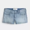 Low-Rise Medium Wash Studded Denim Shortie Shorts Low-Rise Medium Wash Studded Denim Shortie Shorts