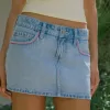 Low-Rise Pink Embroidered Light Wash Denim Mini Skort