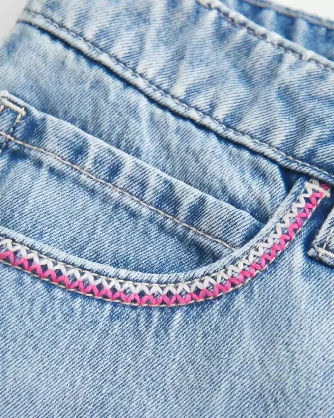 Low-Rise Pink Embroidered Light Wash Denim Mini Skort