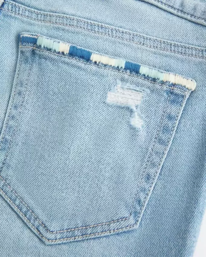 Low-Rise Ripped Light Wash Embroidered Bootcut Jeans Low-Rise Ripped Light Wash Embroidered Bootcut Jeans