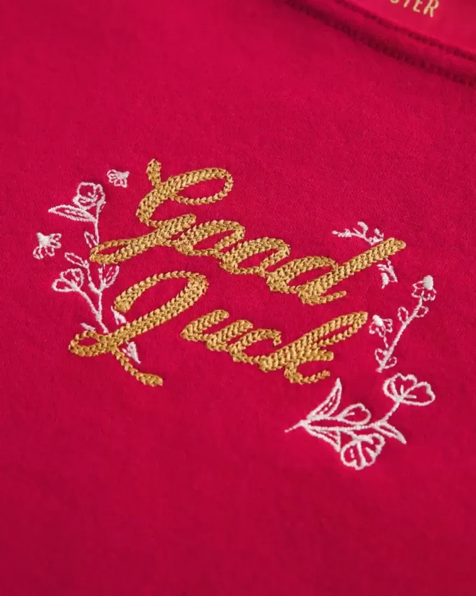 Oversized Off-the-Shoulder Lunar New Year Graphic Sweatshirt Oversized Off-the-Shoulder Lunar New Year Graphic Sweatshirt