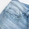 Ultra Low-Rise Distressed Light Wash Sequin Flare Jeans Ultra Low-Rise Distressed Light Wash Sequin Flare Jeans