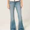 Ultra Low-Rise Medium Wash Flare Jeans