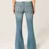 Ultra Low-Rise Medium Wash Flare Jeans