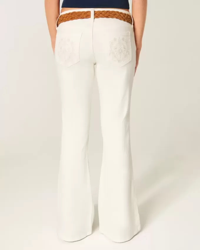 Ultra Low-Rise White Embroidered Pocket Flare Jeans